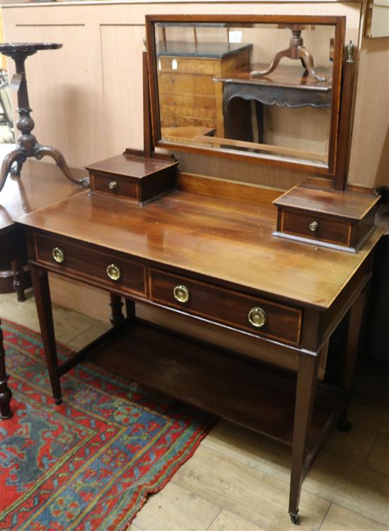 An Edwardian inlaid mahogany dressing table W.107cm
